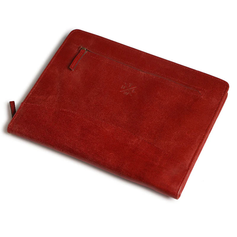 Red leather pouch with a zipper on a white background