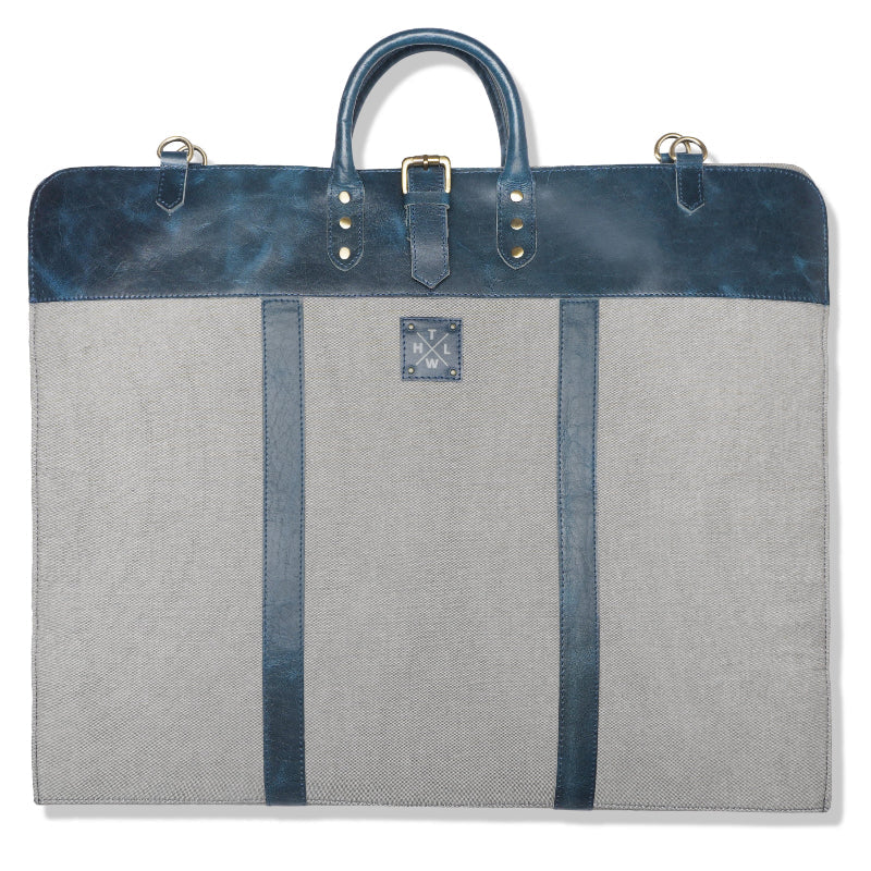 Gray garment bag with blue accents on a white background