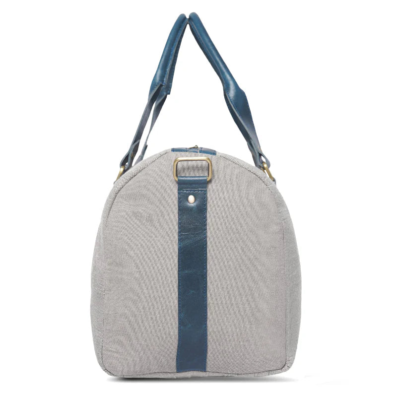 Gray textured handbag with blue straps on a white background
