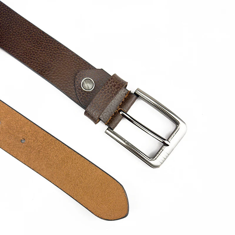 Brown leather belt with a silver buckle on a white background