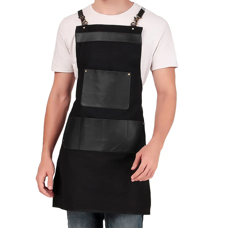 Person wearing a black apron on a white background