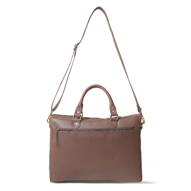 Brown leather handbag with a shoulder strap on a white background