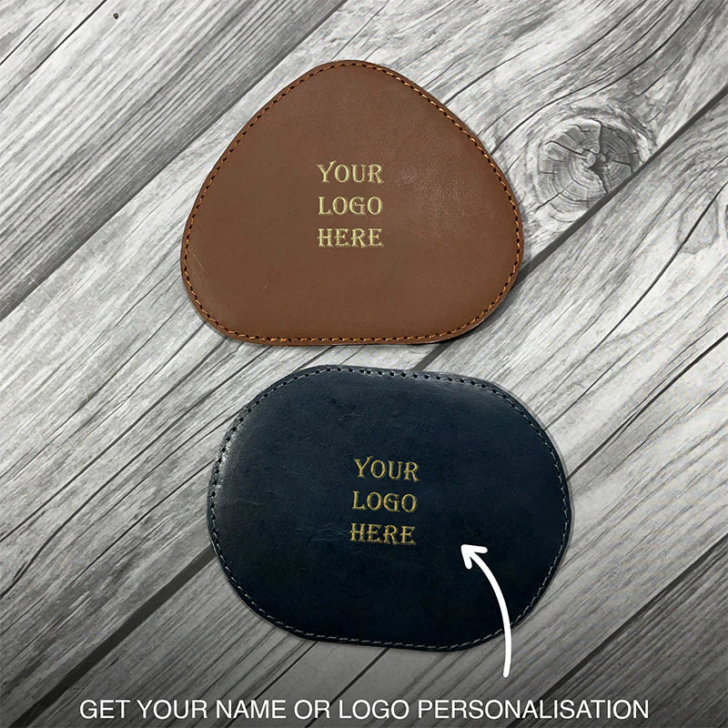 Two leather coasters with &