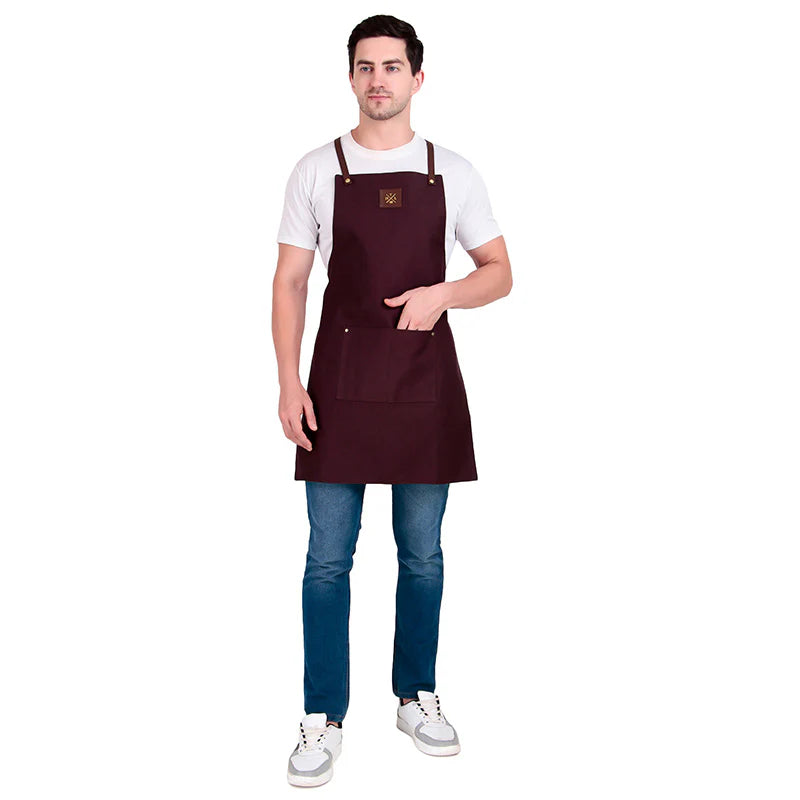 Man wearing a brown apron on a white background