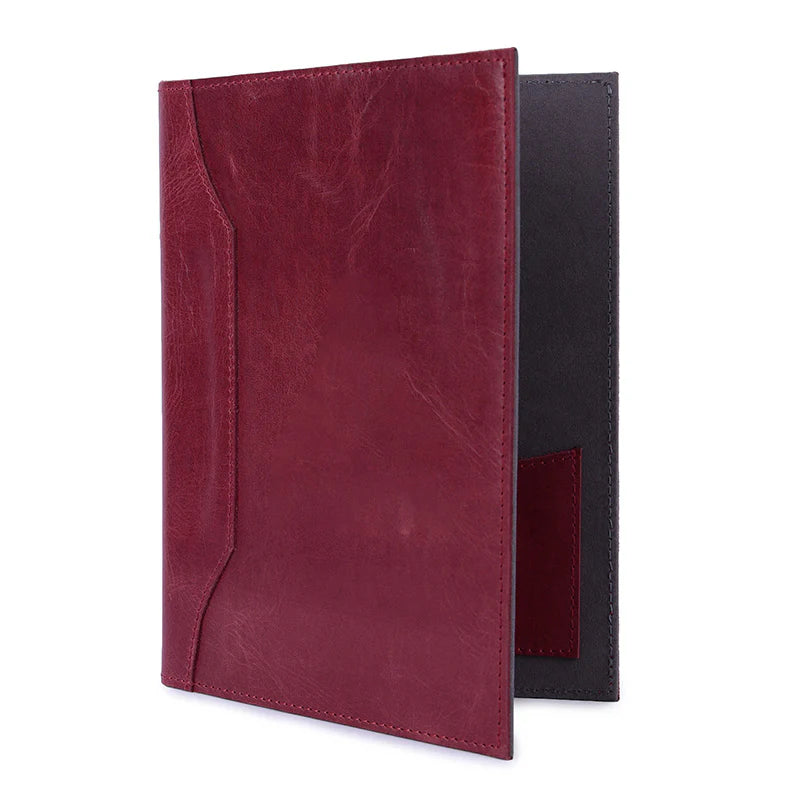 Burgundy leather menu cover with a black interior on a white background