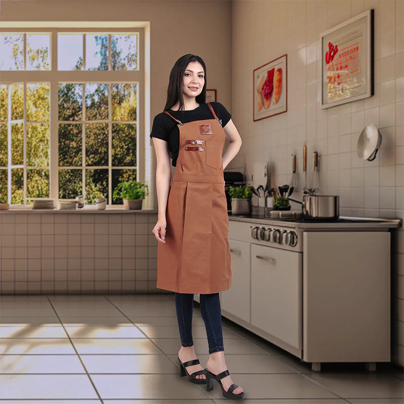 Woman wearing a brown apron in a kitchen