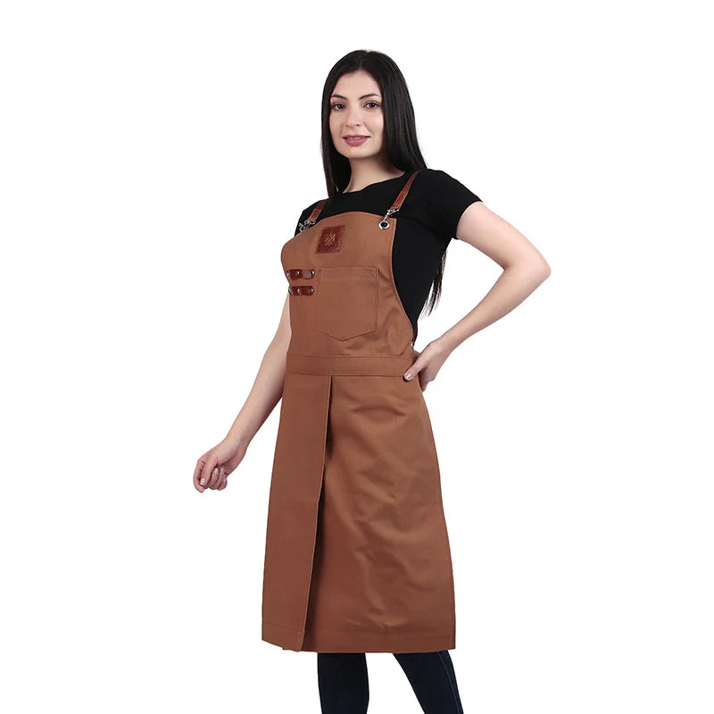 Woman wearing a brown apron on a white background