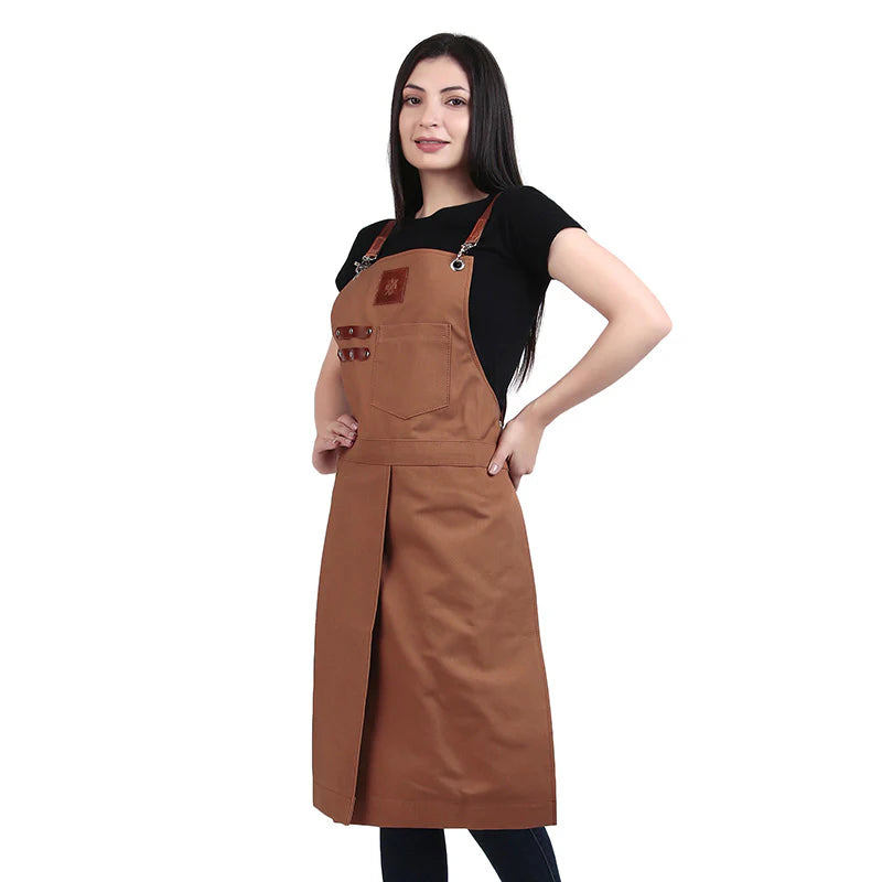 Woman wearing a brown apron on a white background