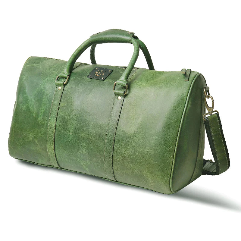 Green leather duffel bag on a white background