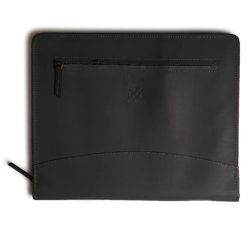 Black leather pouch with zipper on a white background