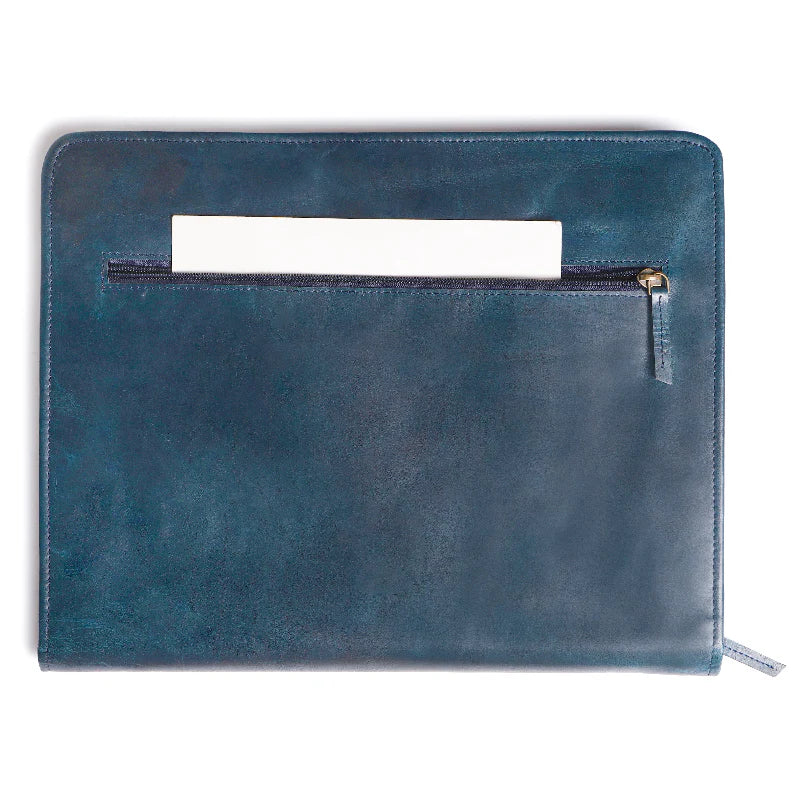 Blue leather pouch with a zipper on a white background