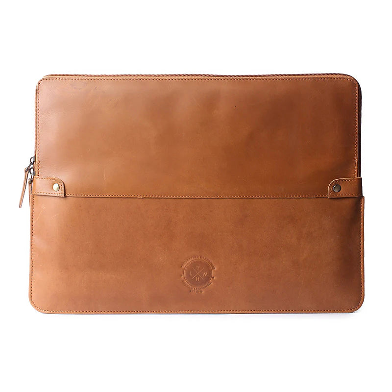 Brown leather laptop sleeve with zipper on a white background