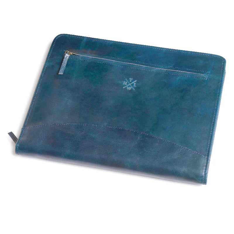 Blue leather pouch with a zipper on a white background
