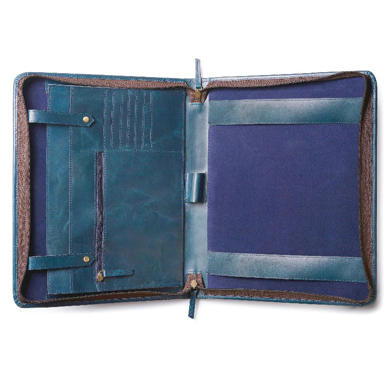 Blue leather portfolio with brown trim on a white background