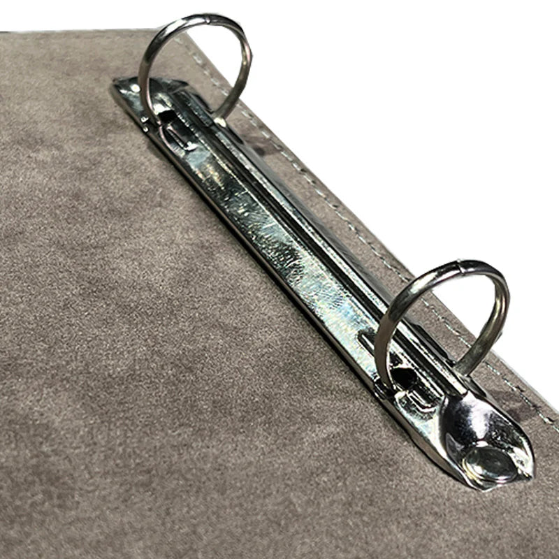 Metal clip on a gray background