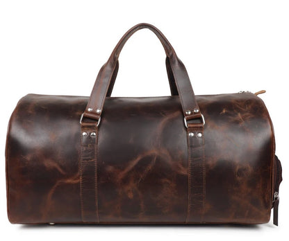 Brown leather duffel bag on a white background