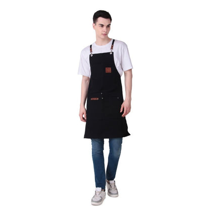 Person wearing a black apron on a white background
