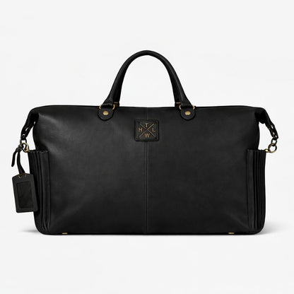 Black leather duffel bag with gold accents on a white background