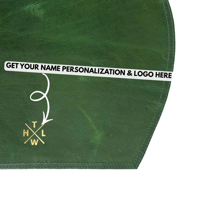 Green fabric with gold embroidery and text space for personalization.