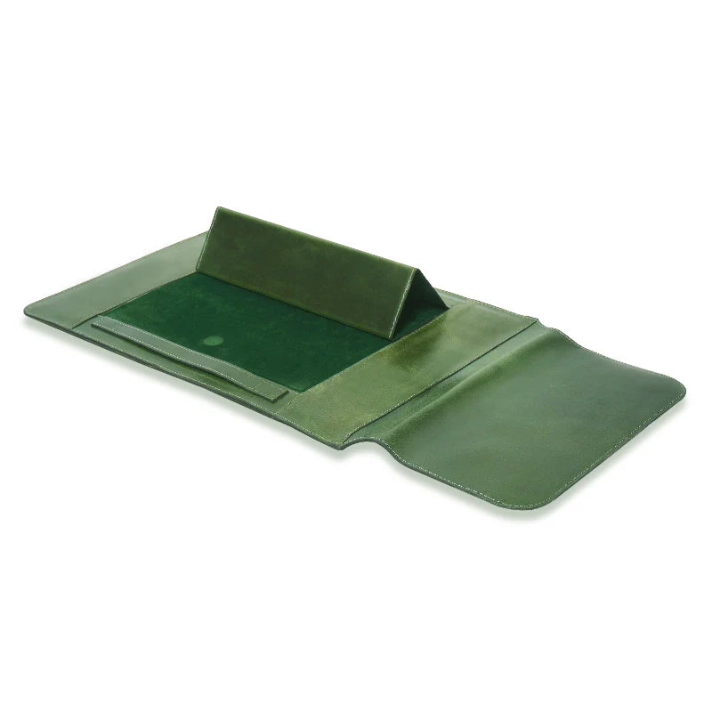 Green Leather sleeve with a small stand on a white background