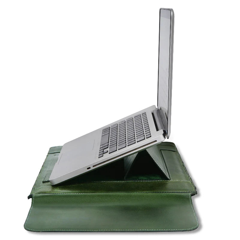 Green laptop stand with a silver laptop on a white background