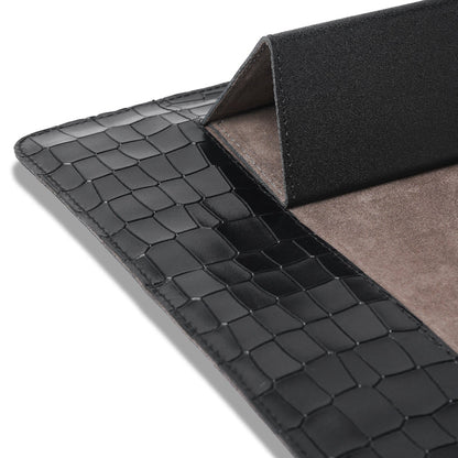 Black crocodile-patterned leather Laptop with gray interior on a white background