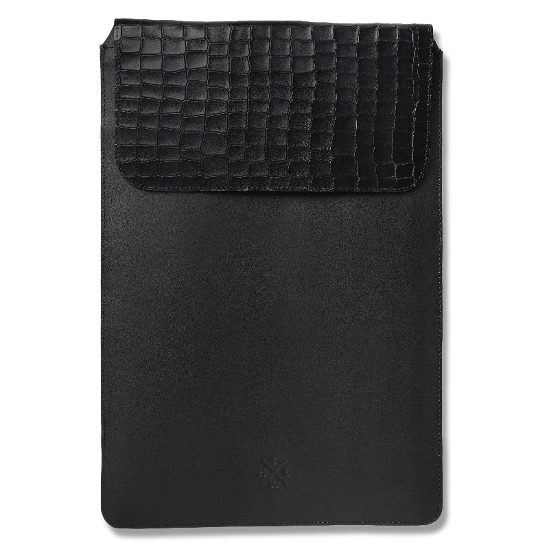 Black leather sleeve with textured flap on a white background