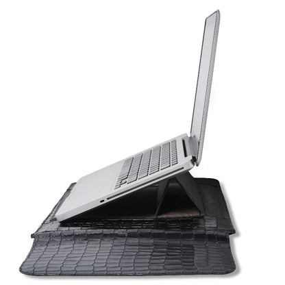 Laptop on a sleeve black stand with a white background