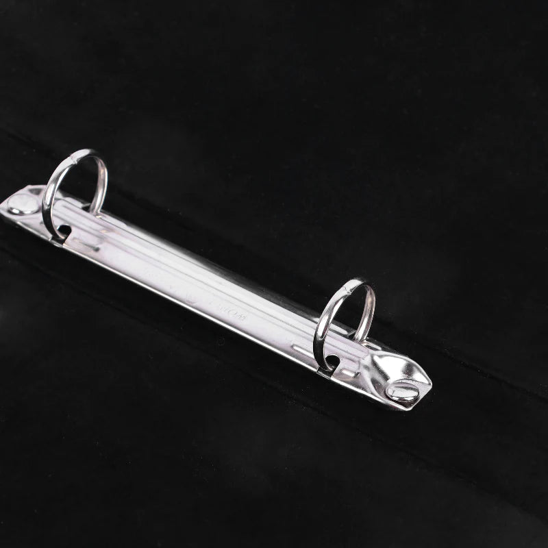 Metallic clip on a black background