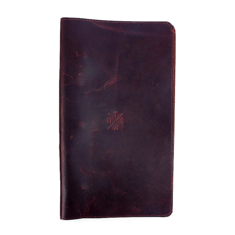 Dark brown leather menu cover with a visible brand logo on a white background