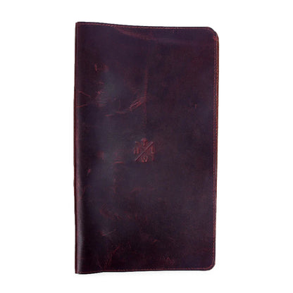 Dark brown leather menu cover with a visible brand logo on a white background
