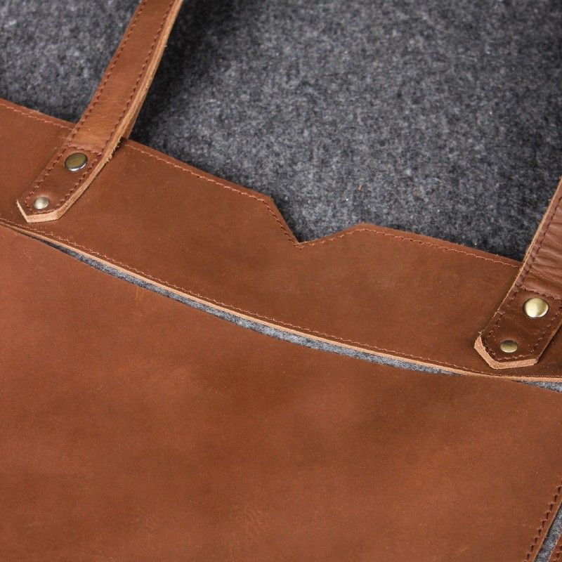 full grain leather bag stitching