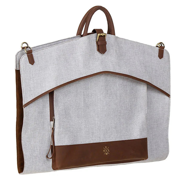 Gray garment bag with brown accents on a white background
