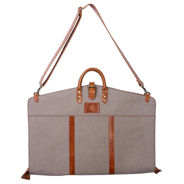 Gray garment bag with brown straps and accents on a white background