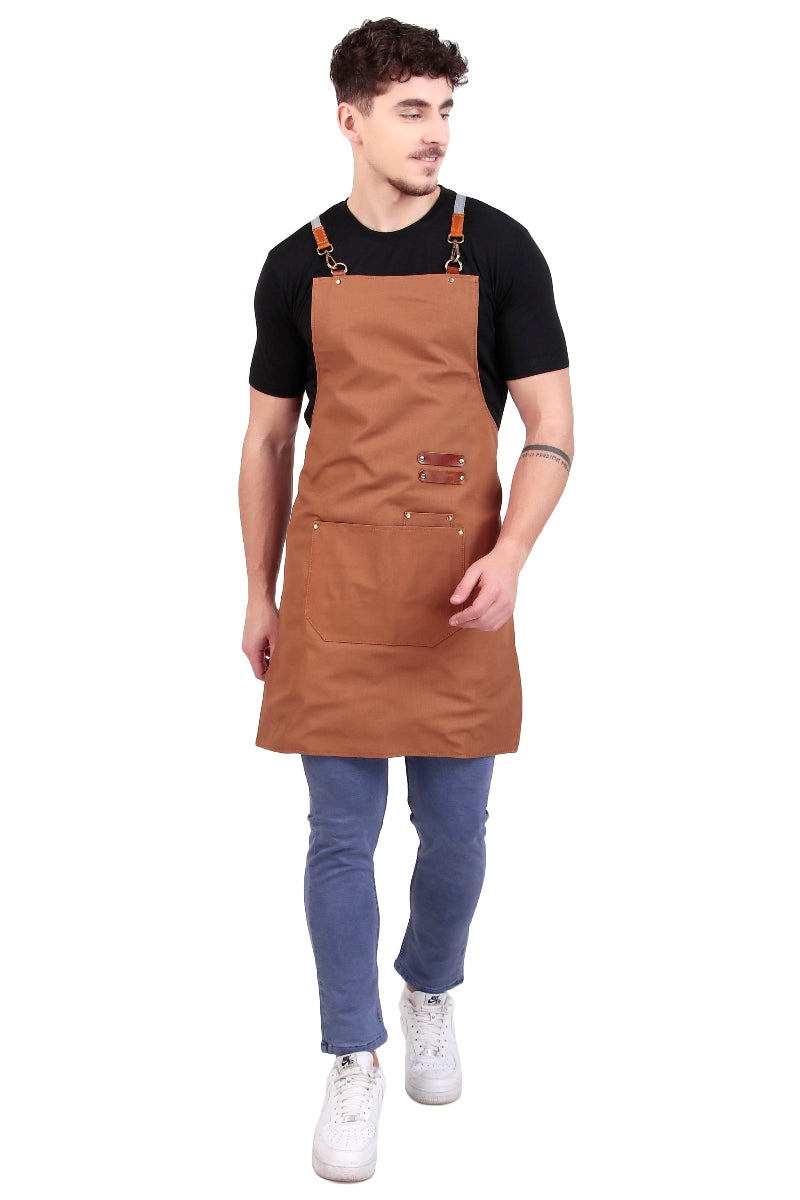 Man wearing a brown apron on a white background