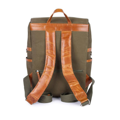 Green backpack with brown leather straps on a white background