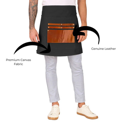 Person wearing a black apron with brown leather pockets on a white background