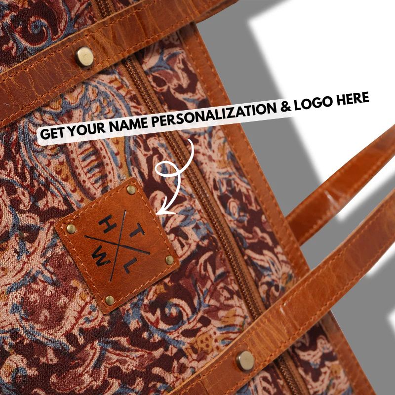 Patterned bag with a leather patch and text overlay for personalization.