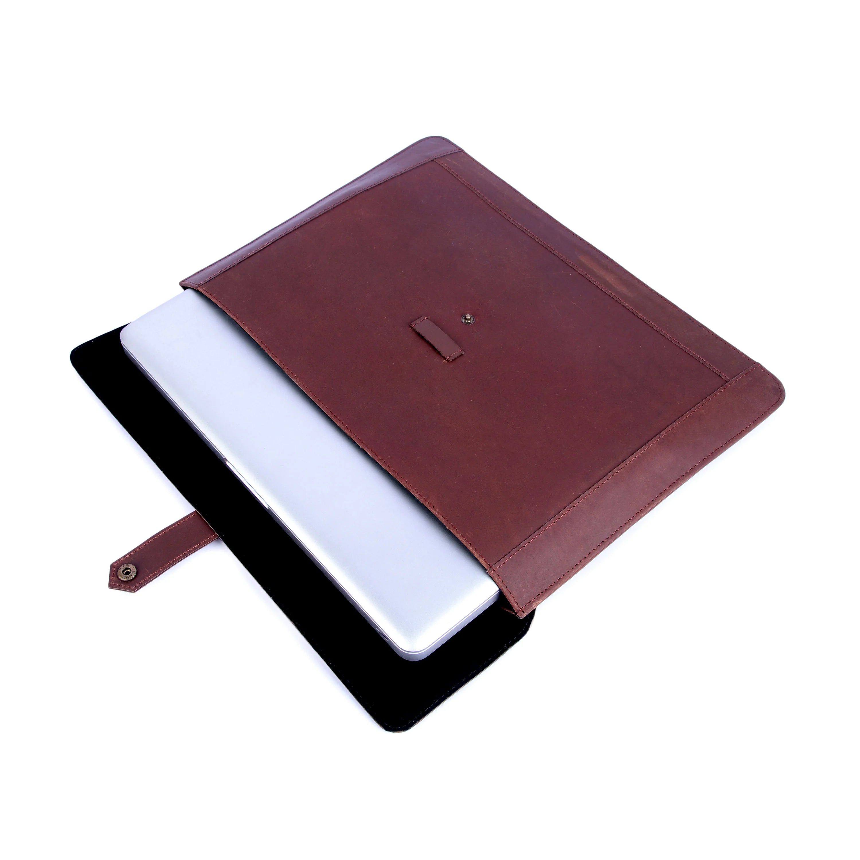Brown leather notebook with a white interior on a white background
