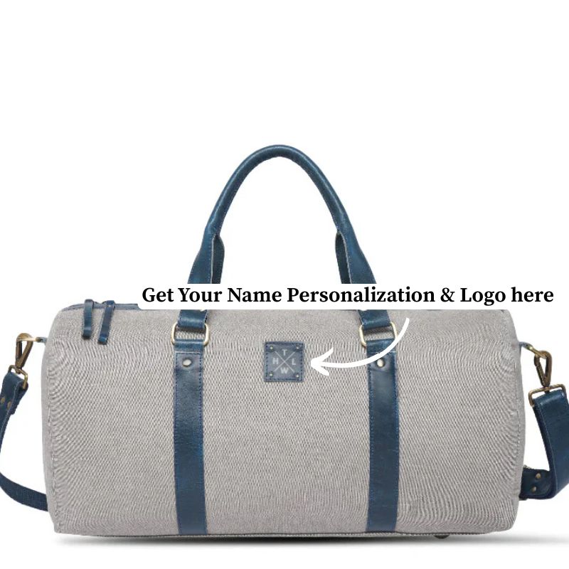 Gray duffel bag with blue straps on a white background