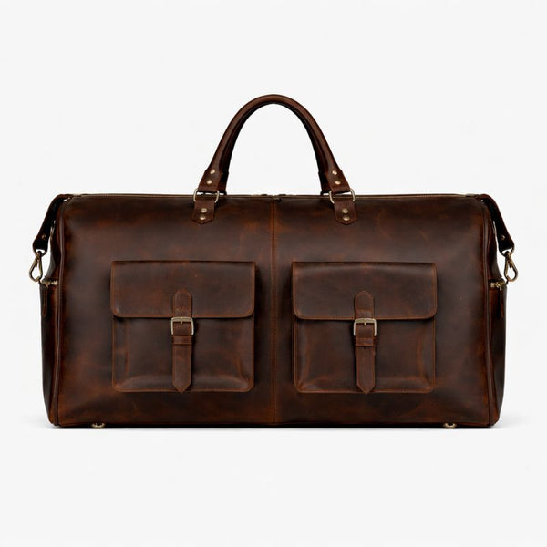 Brown leather duffel bag on a white background
