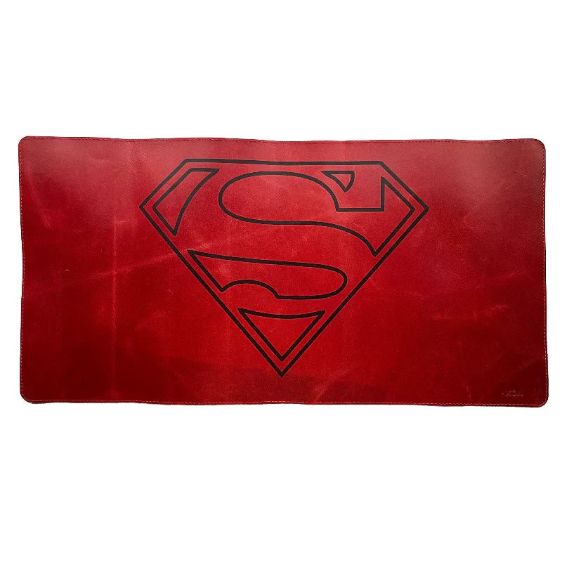 Red mat with a black Superman logo on a white background