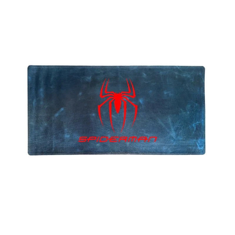 Spider-Man themed mouse pad with red spider logo on a blue background