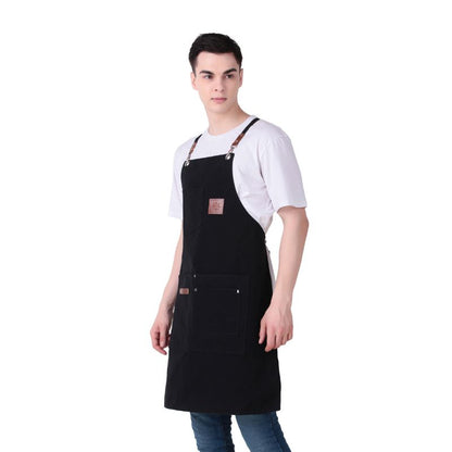 Person wearing a black apron on a white background