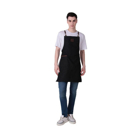 Person wearing a black apron on a white background