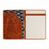 Open brown leather and canvas folder featuring document pockets, pen holders, and a black and white patterned interior