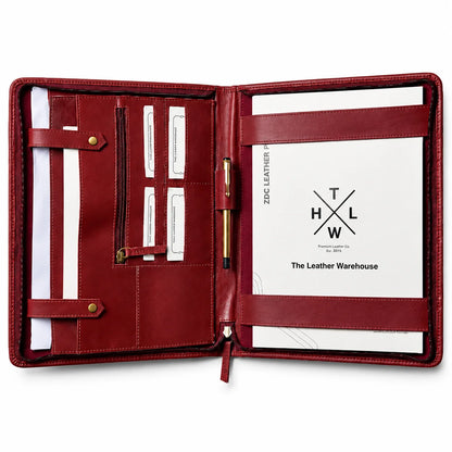 Open burgundy leather portfolio with business card slots, a pen holder, and a document compartment
