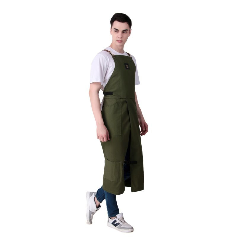 Person wearing a green apron on a white background