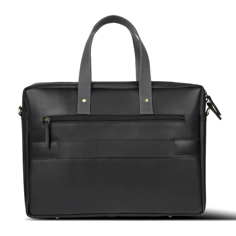 Black leather briefcase with gold zipper pulls on a white background