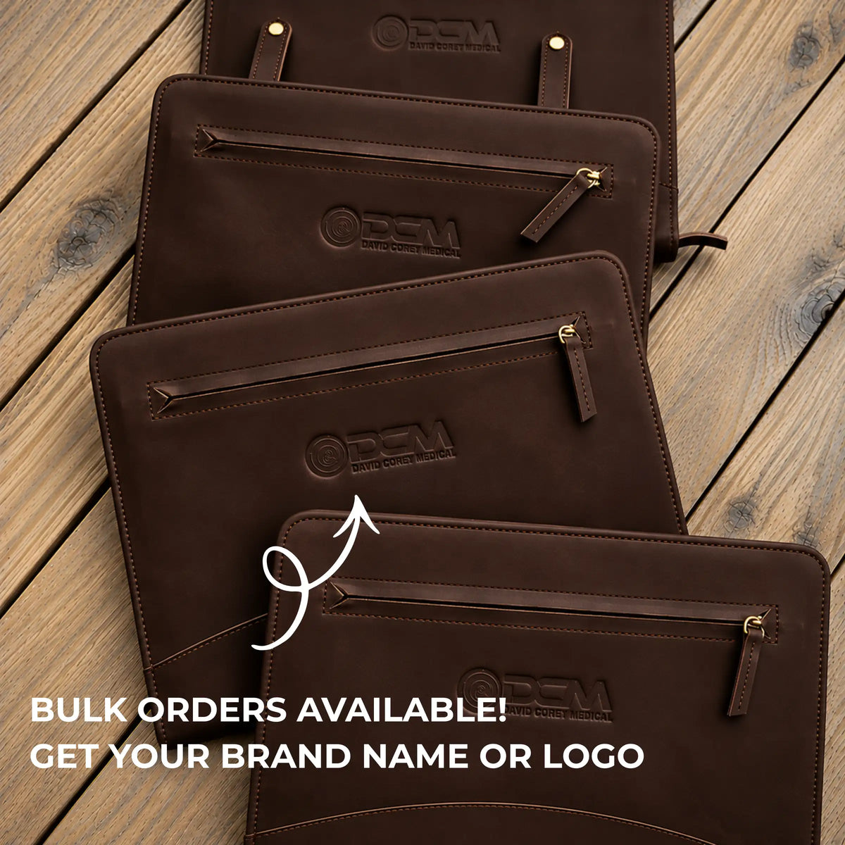 Four dark brown leather document pouches arranged diagonally on a wooden plank surface, each embossed with the OPM logo. White text at the bottom reads &